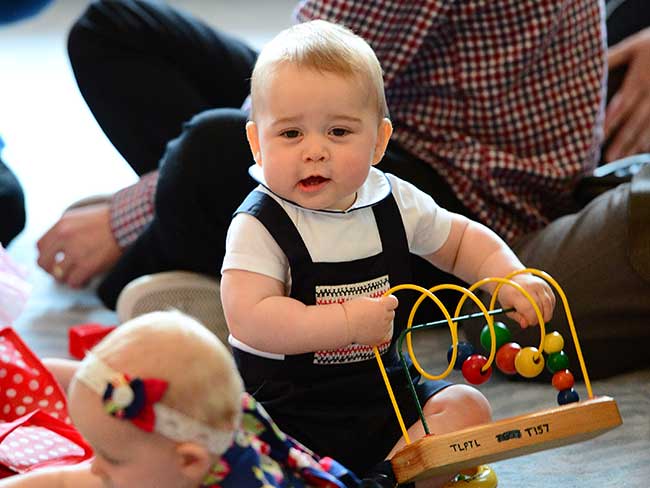 Baby Prince George plays with toy