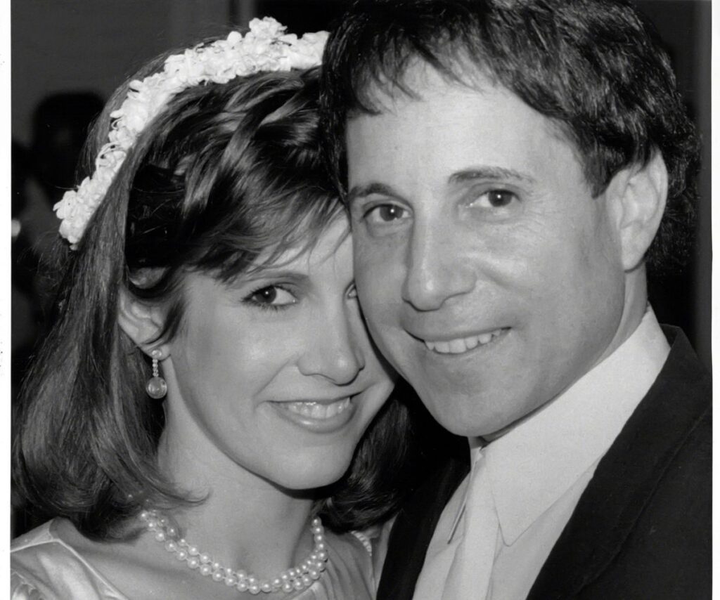 Paul Simon and Carrie Fisher on the wedding day in 1983.