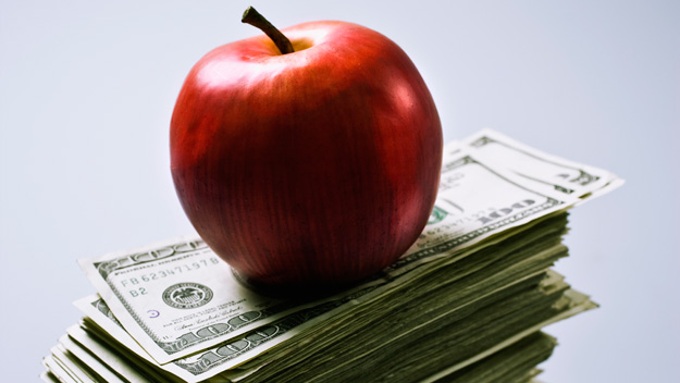 apple and money, getty images 