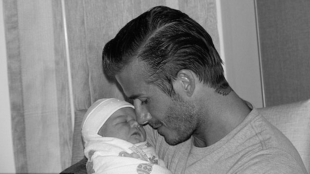 Beckhams introduce baby Harper to the world