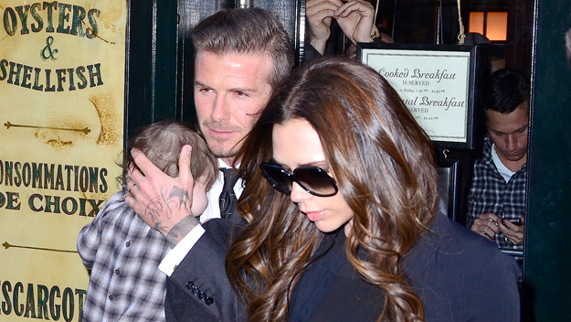 David and Victoria Beckham with their eight-month-old daughter Harper.