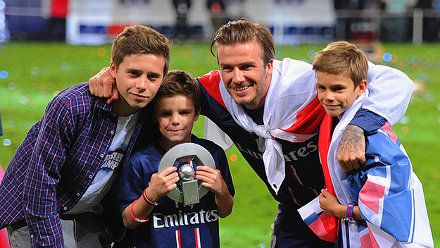 David Beckham with his three sons Brooklyn, Romeo and Cruz.
