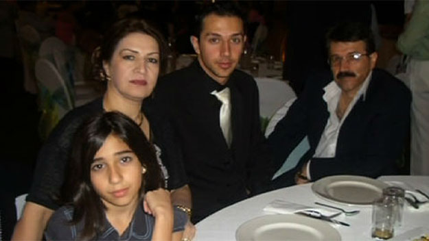 Arman Abrahimzadeh photographed with his family. 