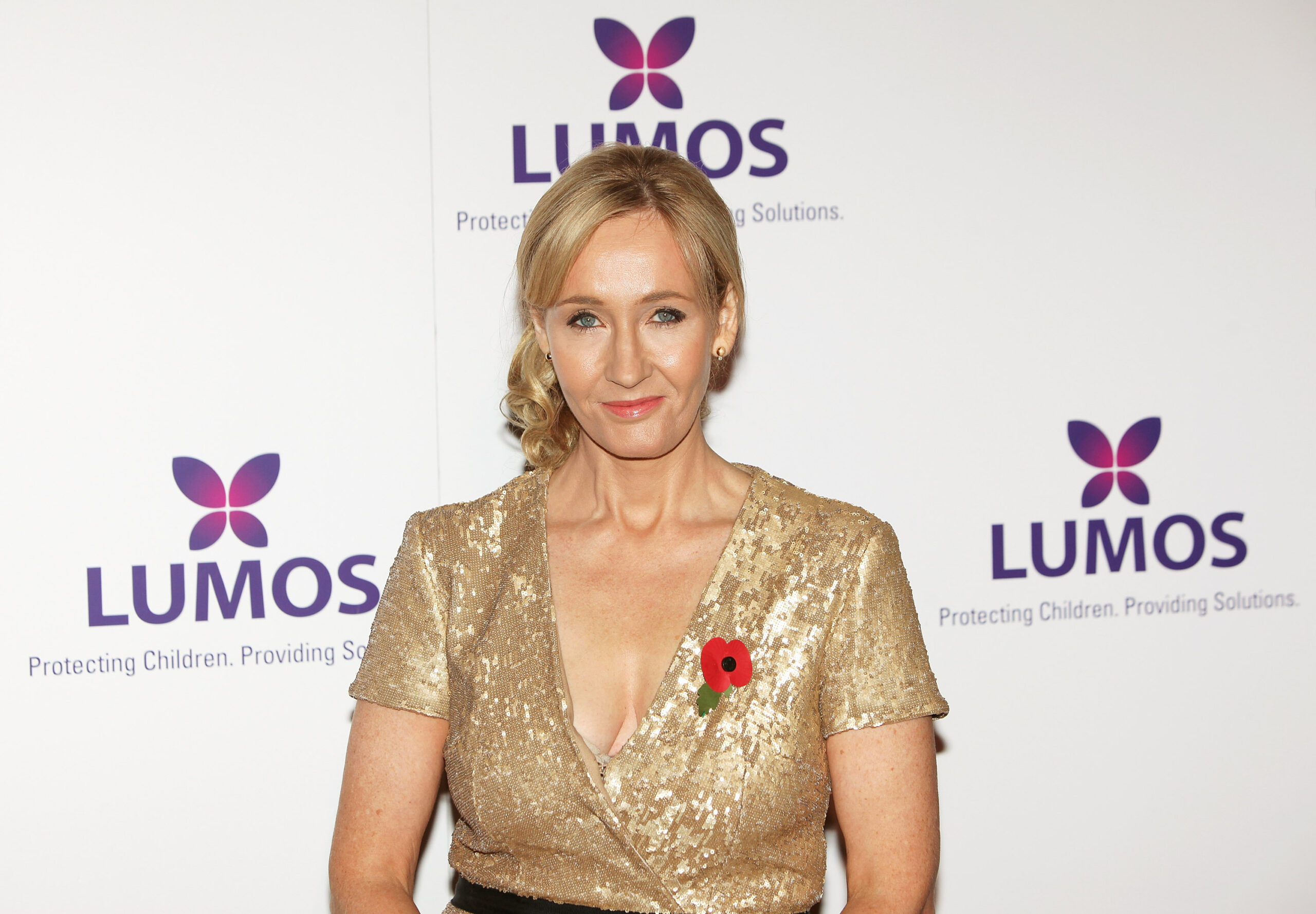 JK Rowling, shown at a London fundraising event last year, is set to adapt her textbook into three films.