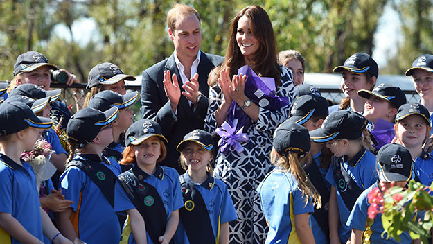 Prince William and Kate Middleton with school children