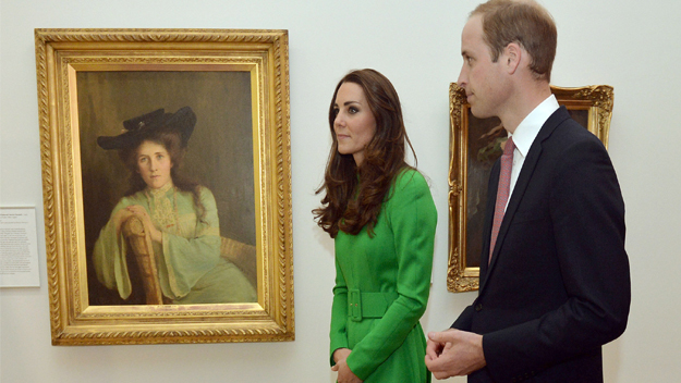 Prince William and Kate Middleton looking at portrait