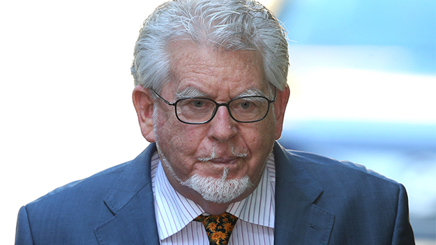 Rolf Harris admits being ‘touchy-feely’