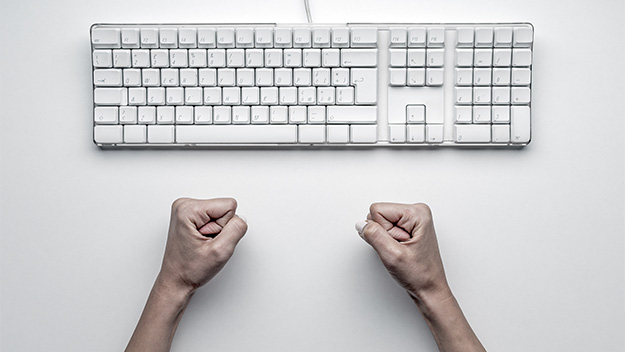 keyboard with closed fists, stock image.