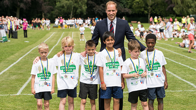 Prince William with school children