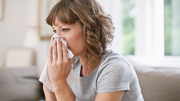 Woman sick with the flu, stock image 