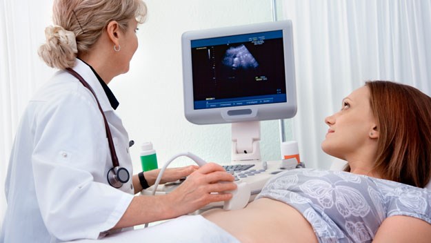 Pregnant woman getting a sonogram