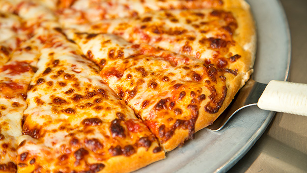 A woman reports domestic abuse by pretending to order a pizza.