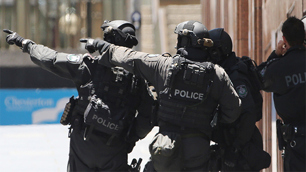 Sydney siege: Schools in lockdown