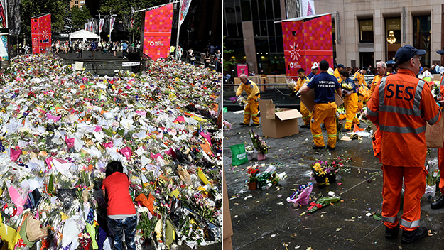 Flowers in Martin Place being clear away on Tuesday.