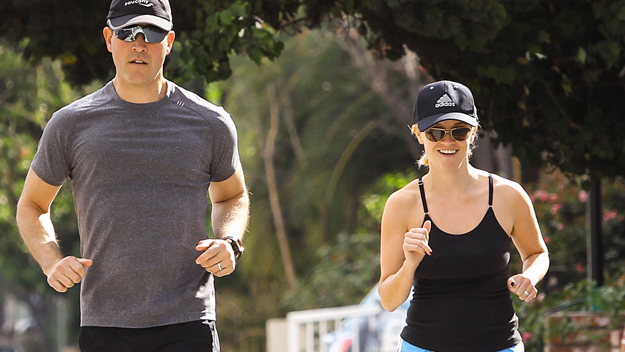 Fat shaming Reese Witherspoon and Jim Toth ably demonstrate the act of a couple encouraging each other to be healthier together