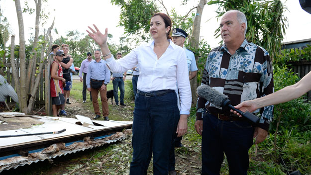 Queensland Premier Annastacia Palaszczuk with Mayor of Livingstone Bill Ludwig survey Tropical Cyclone Marcia's damage to a house in Yeppoon