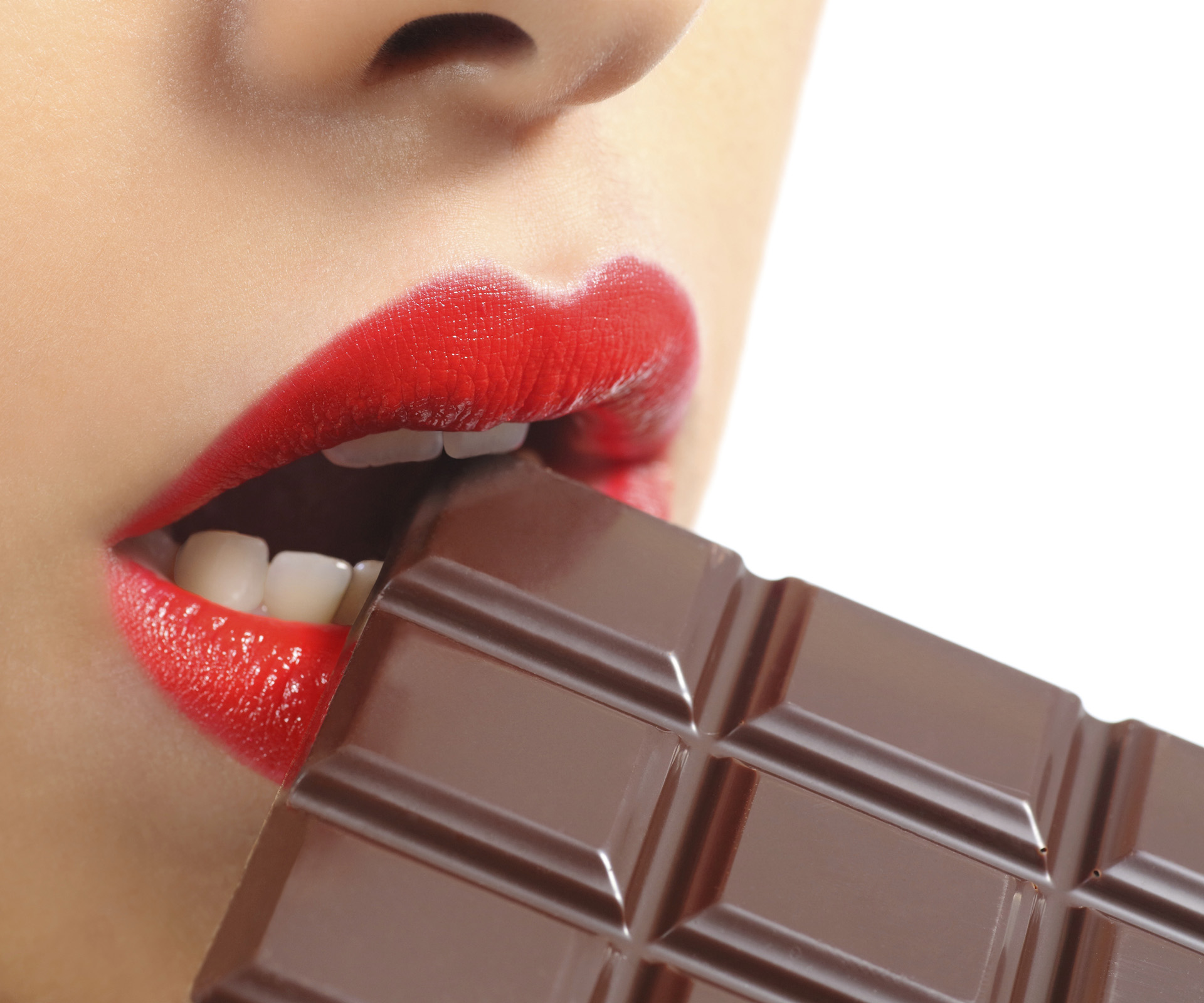 Woman eating chocolate 