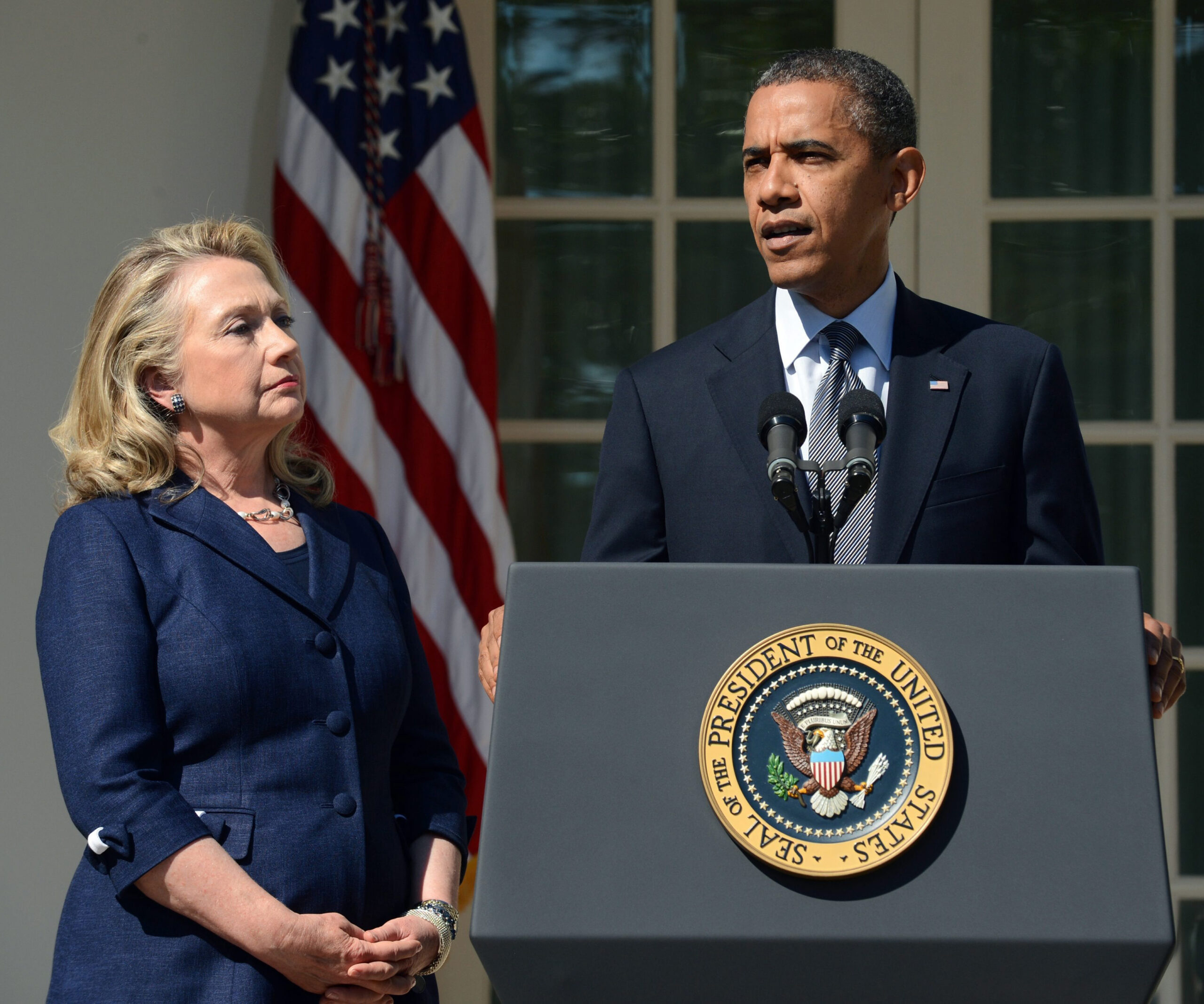 Former US Secretary of State Hillary Clinton and US President Barack Obama. PHOTO: Getty.