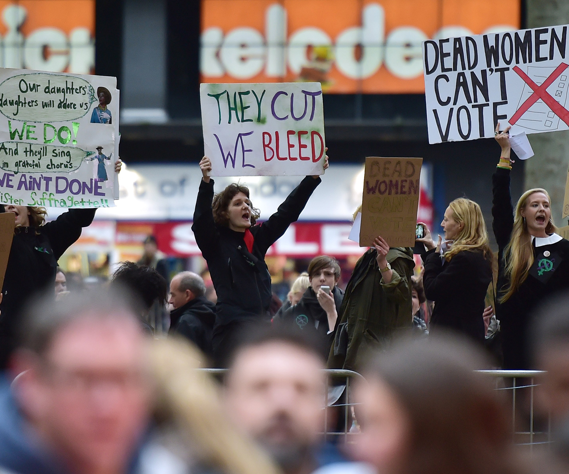 London suffragettes premiere interrupted by domestic violence protesters