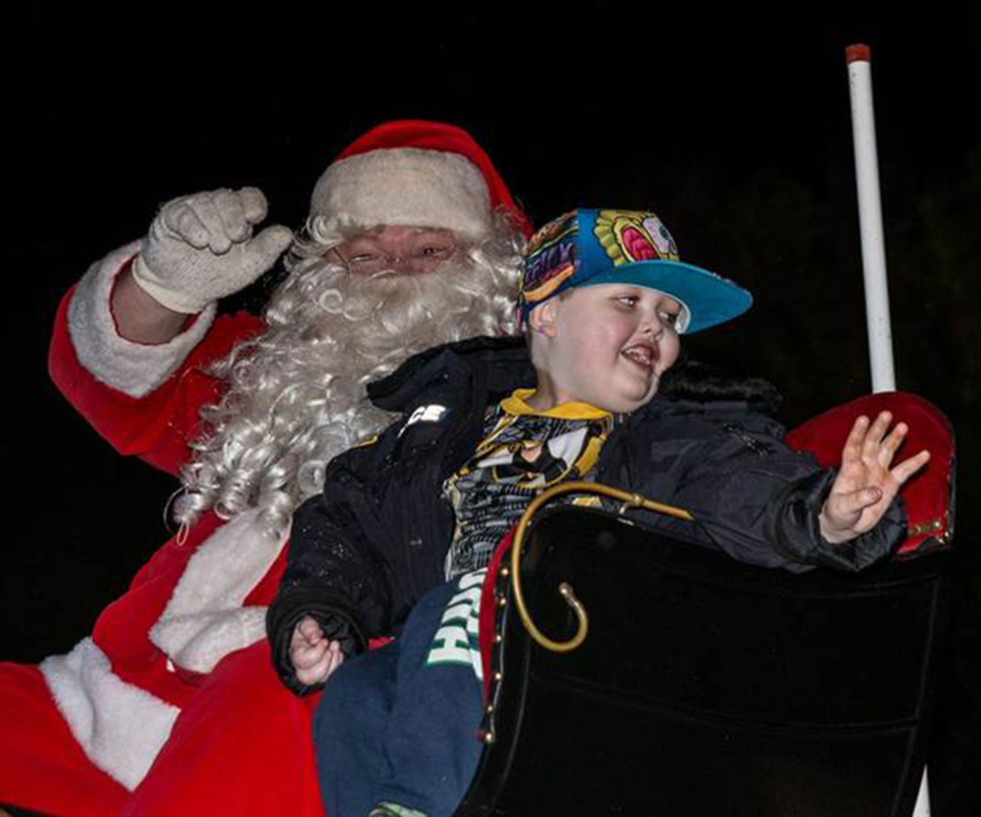 Town celebrates Christmas early for terminally ill boy