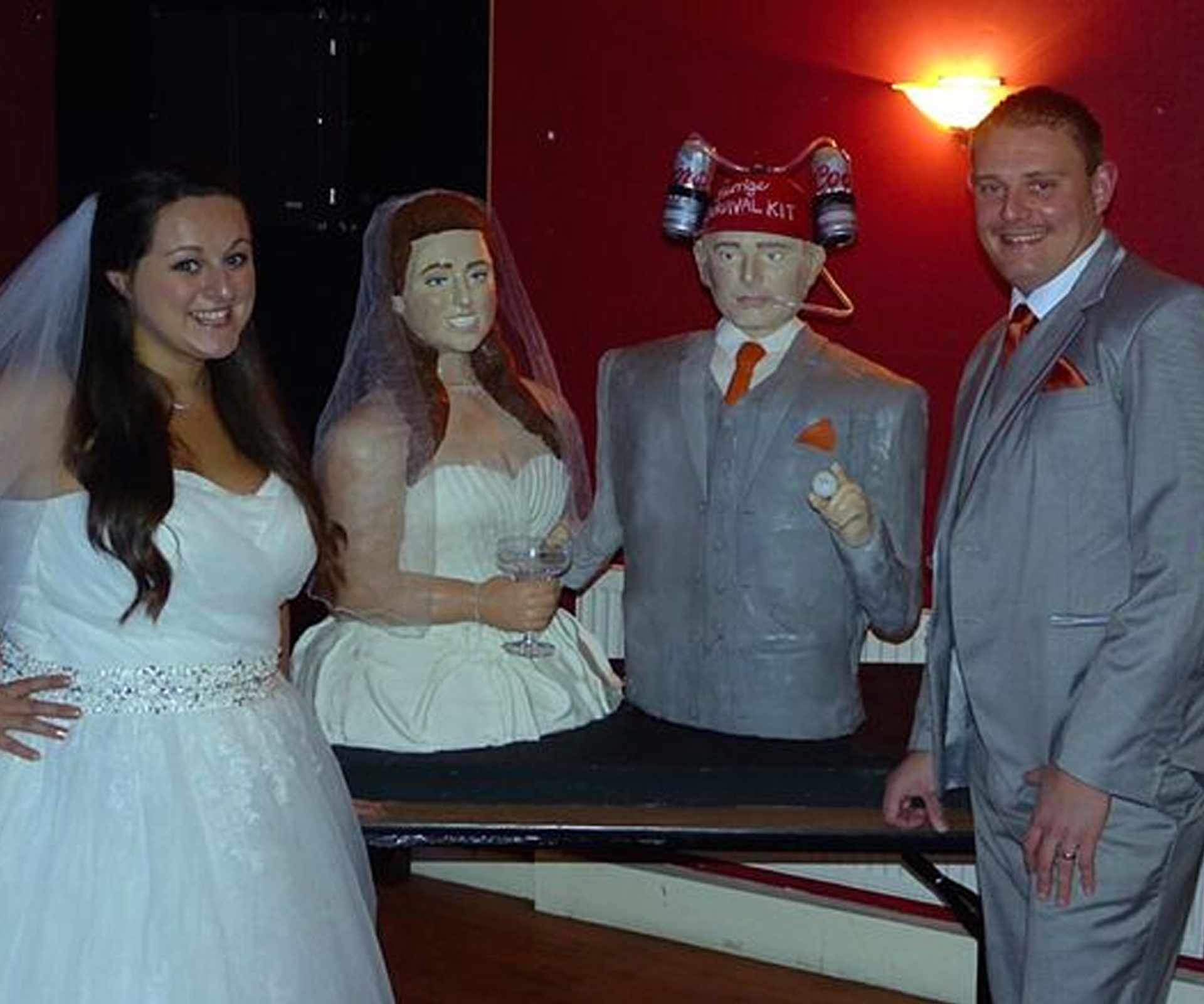 This wedding takes the cake! Woman recreates lifesized cakes of bride and groom