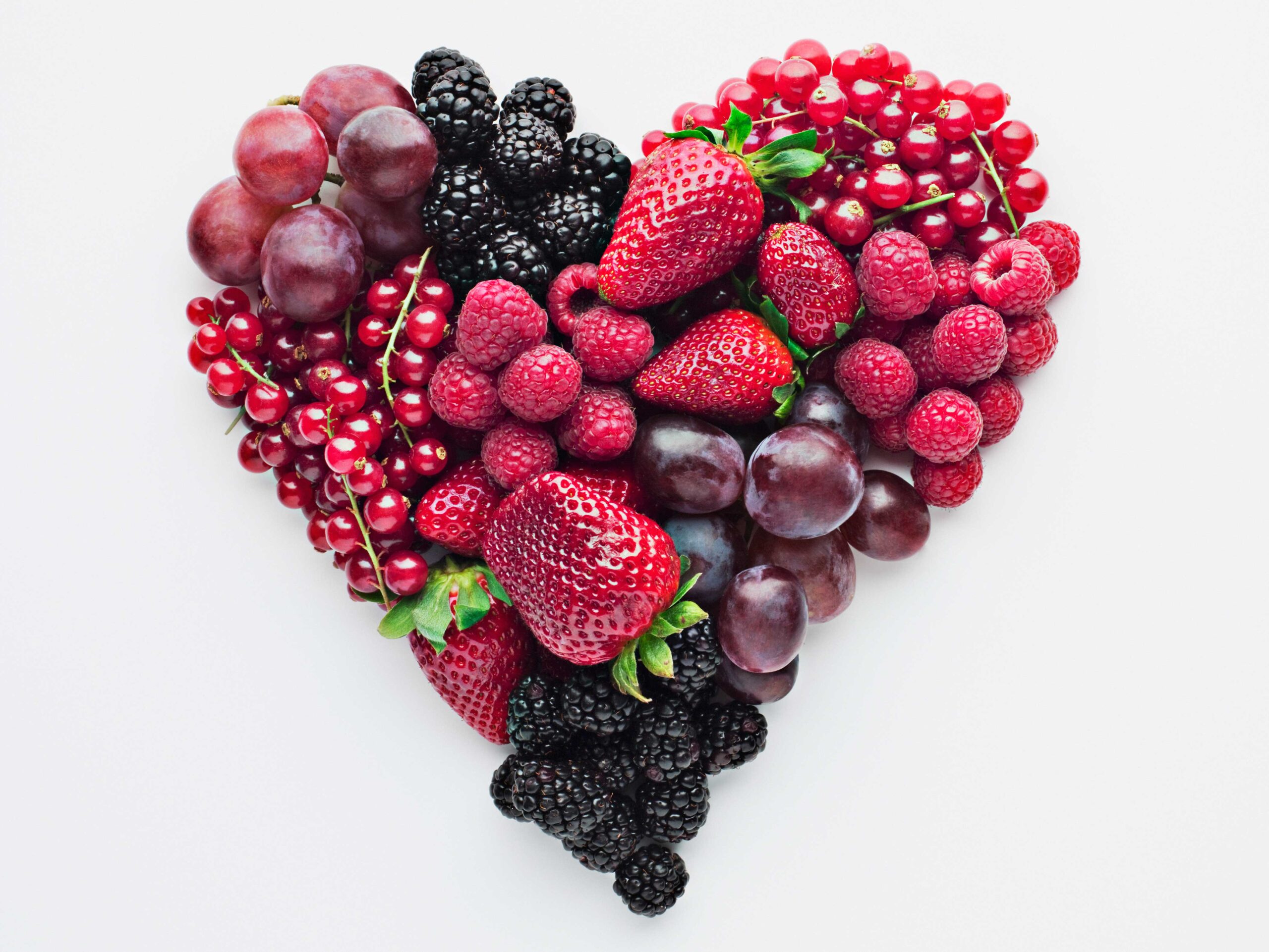 Fruit and berries arranged in a love heart