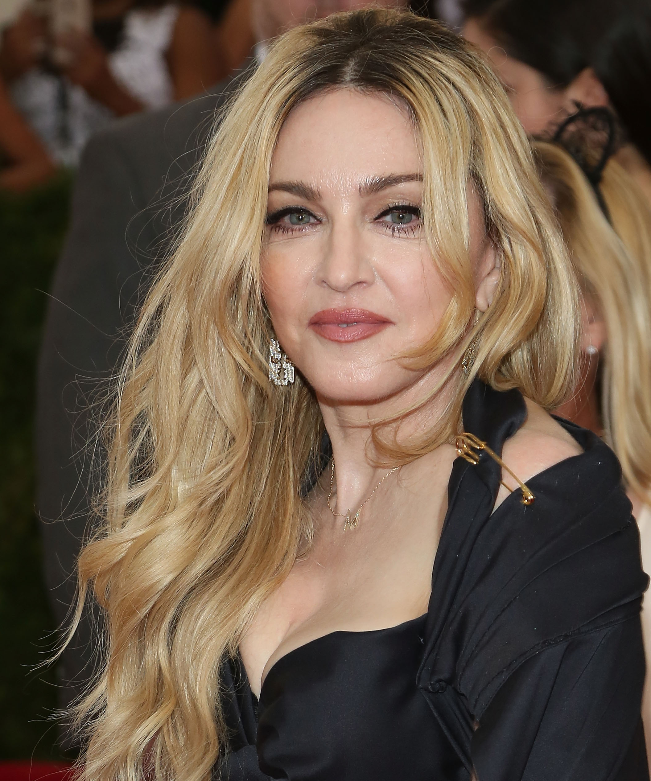 Madonna lashes out at fans after they boo her for being late