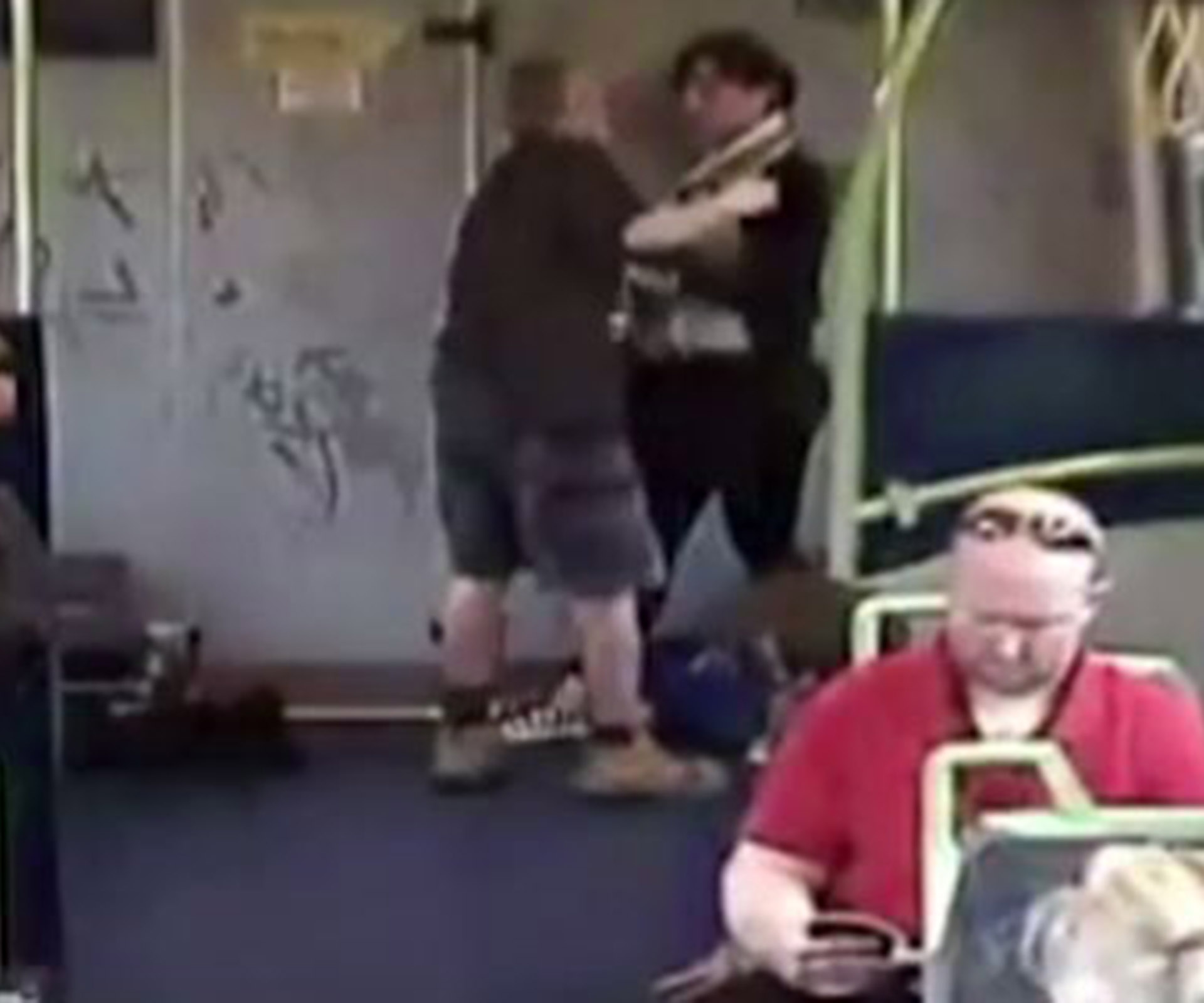 Disturbing footage of man choking woman on Melbourne train