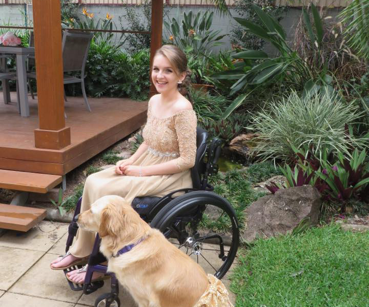 QLD teen and service dog wear matching dresses to formal