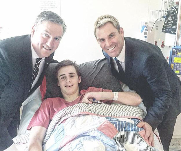 Shane Warne gives $340,000 to paralysed 14-year-old boy