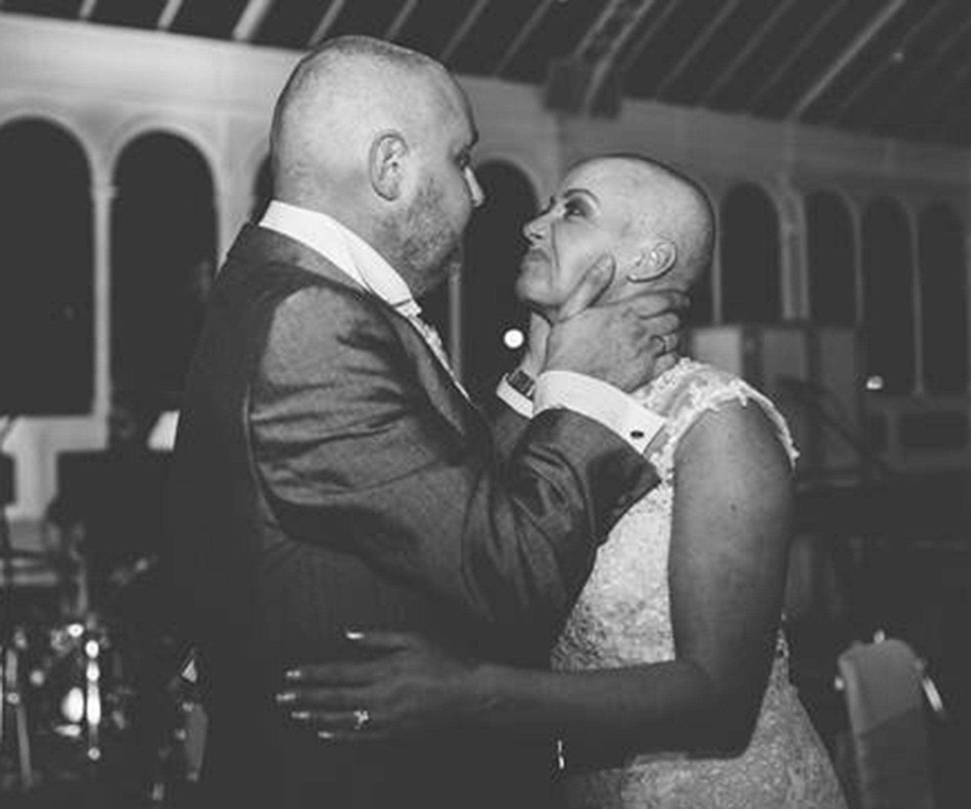Bride shaves head to support terminally ill groom