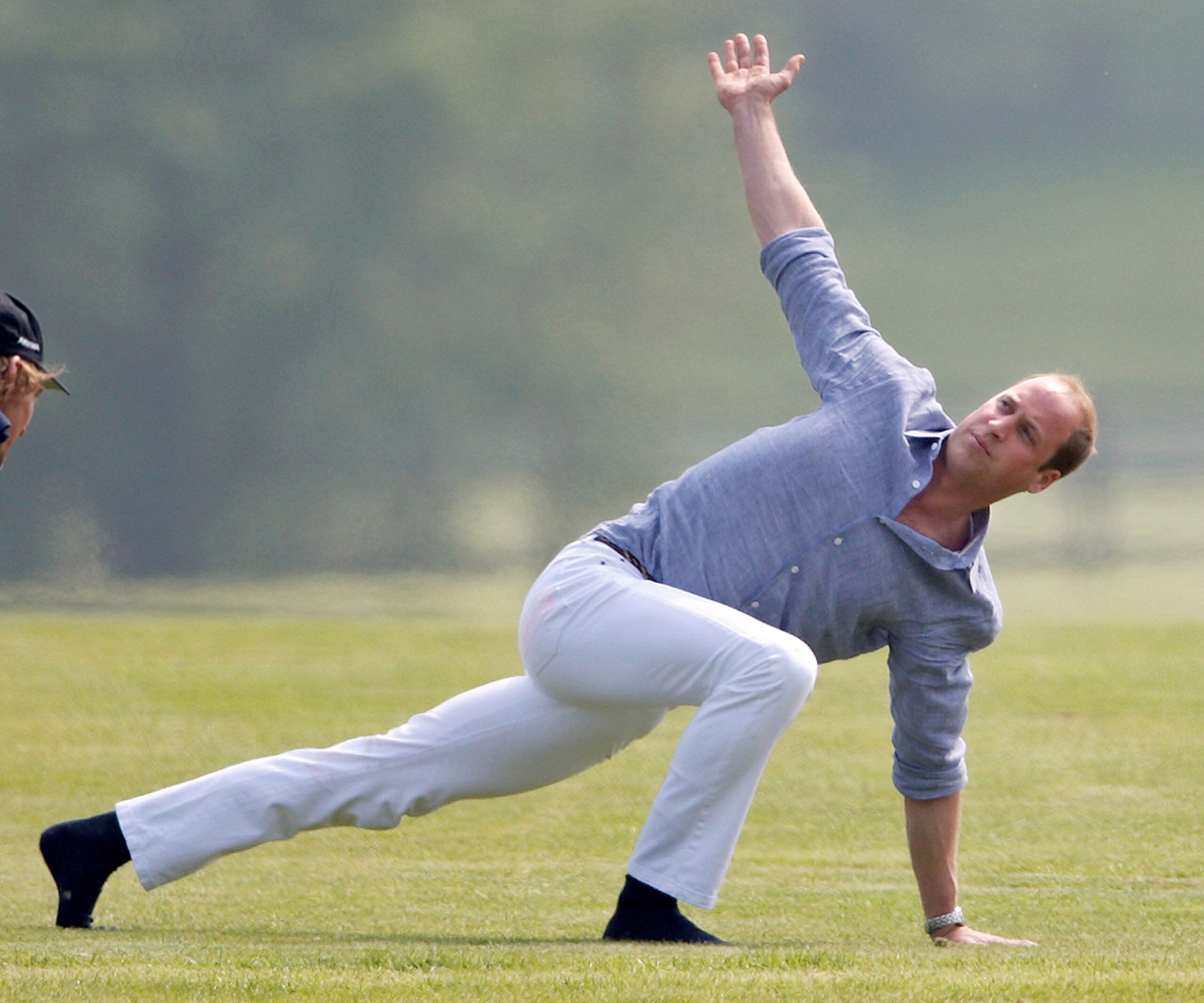 Prince William does yoga in white jeans