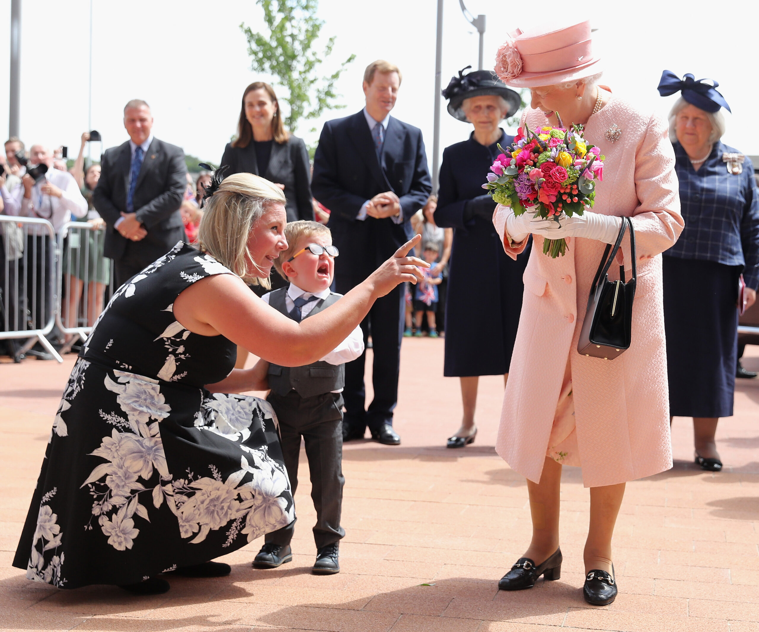 Little boy cries when meeting the queen