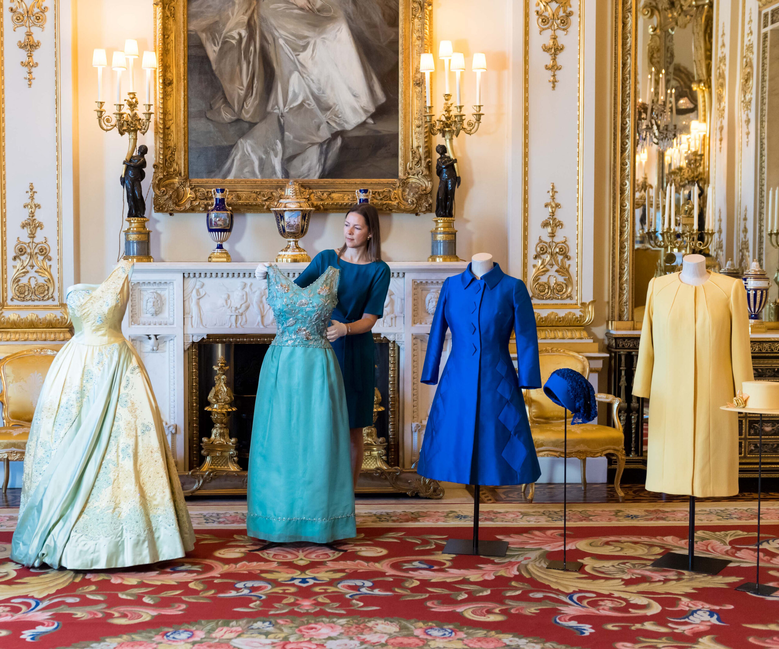 Queen’s iconic outfits go on display
