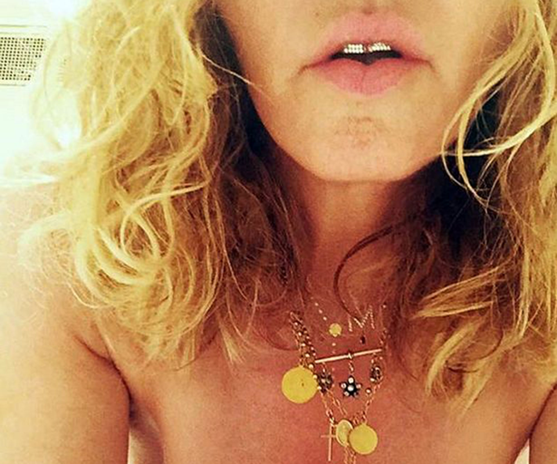 Madonna posts nude photo to encourage Americans to vote