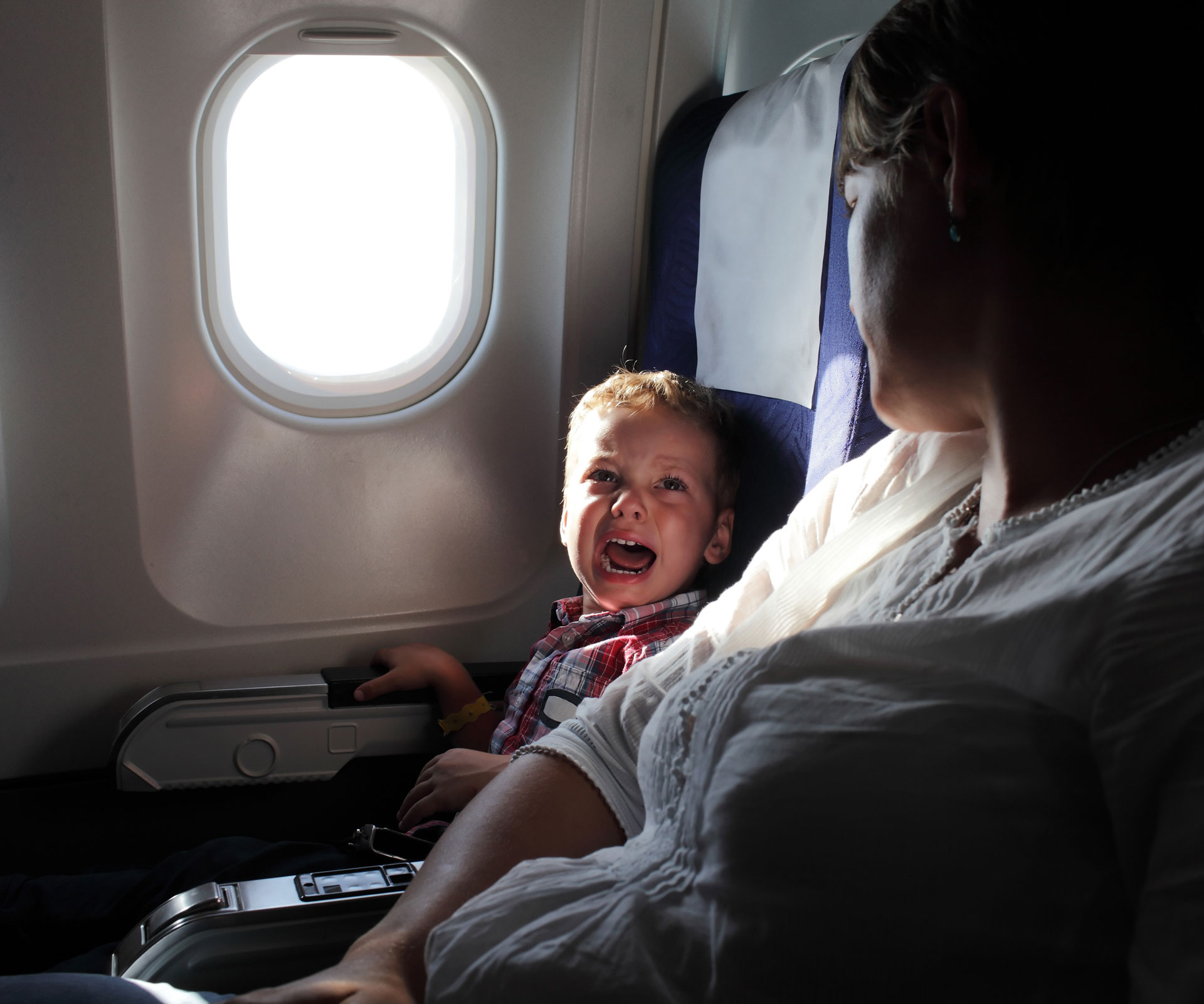 Should all planes have kid-free zones?