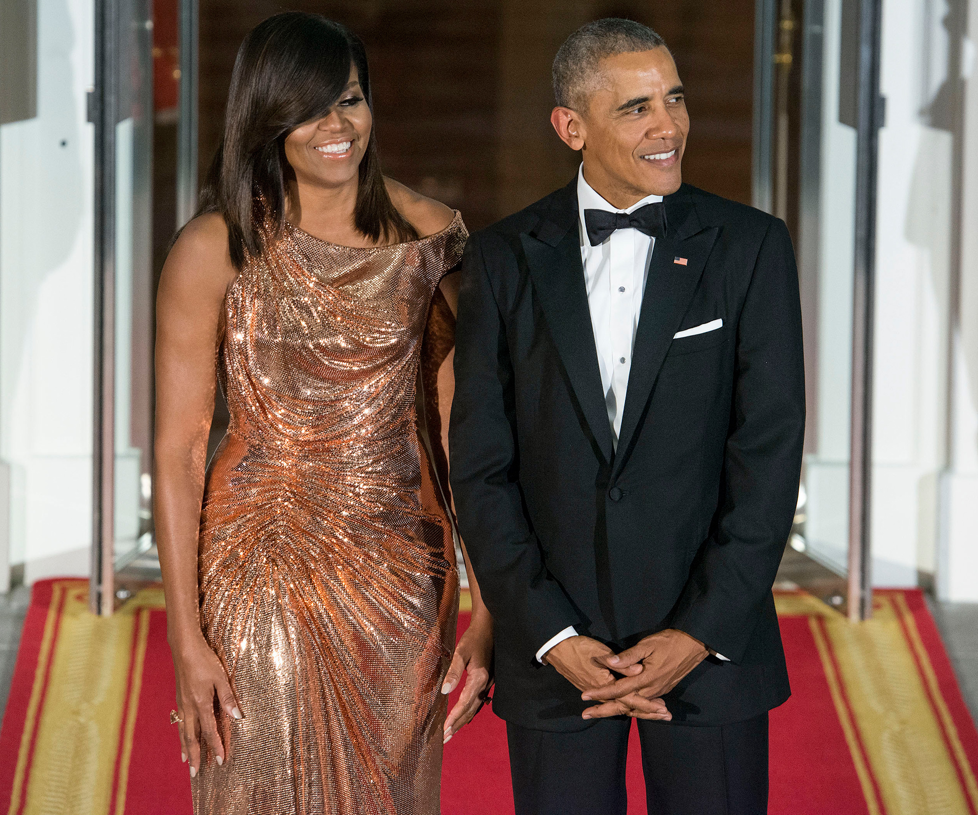 Michelle Obama sizzles in stunning Versace gown