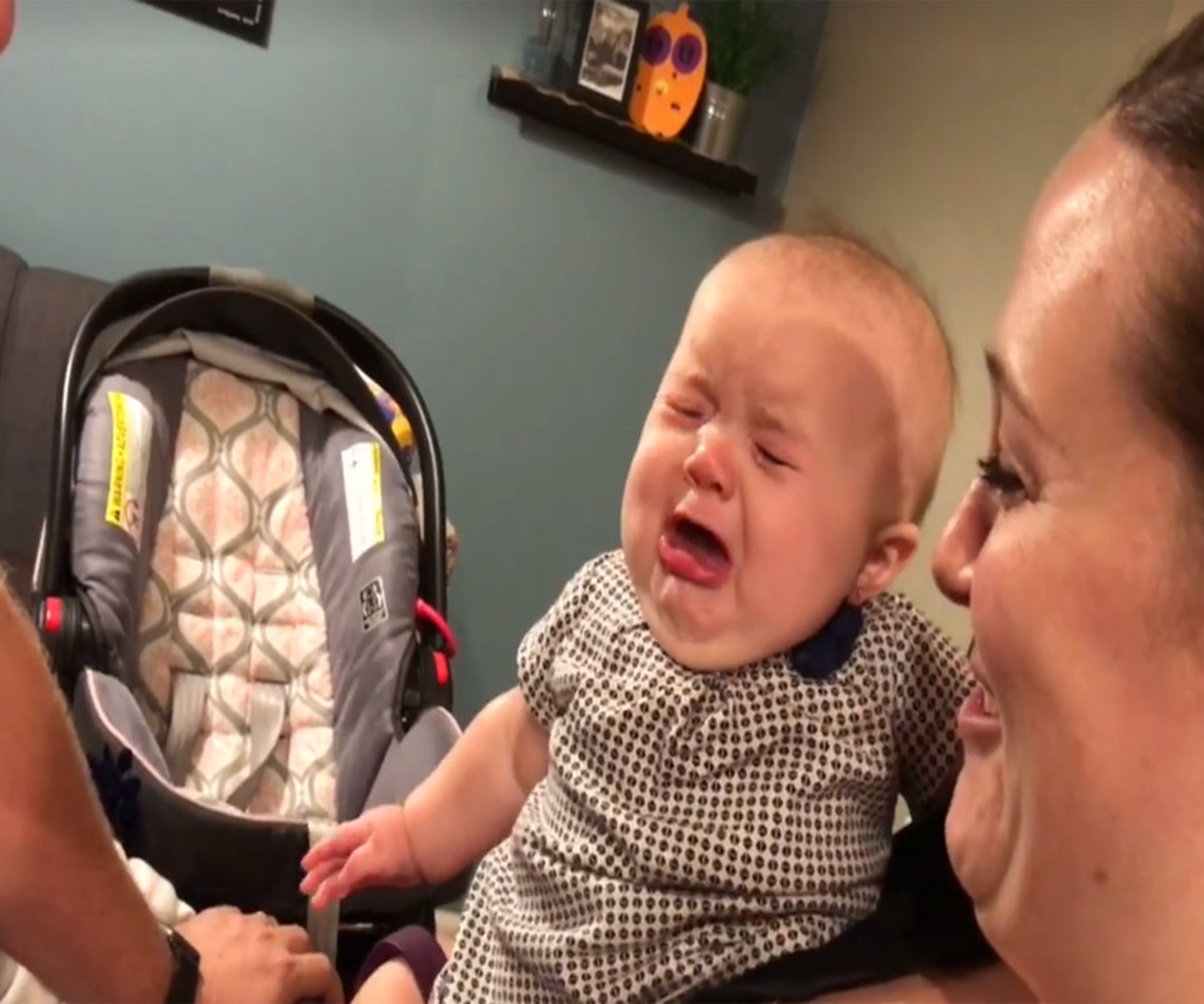 Watch this baby get jealous every time her parents kiss