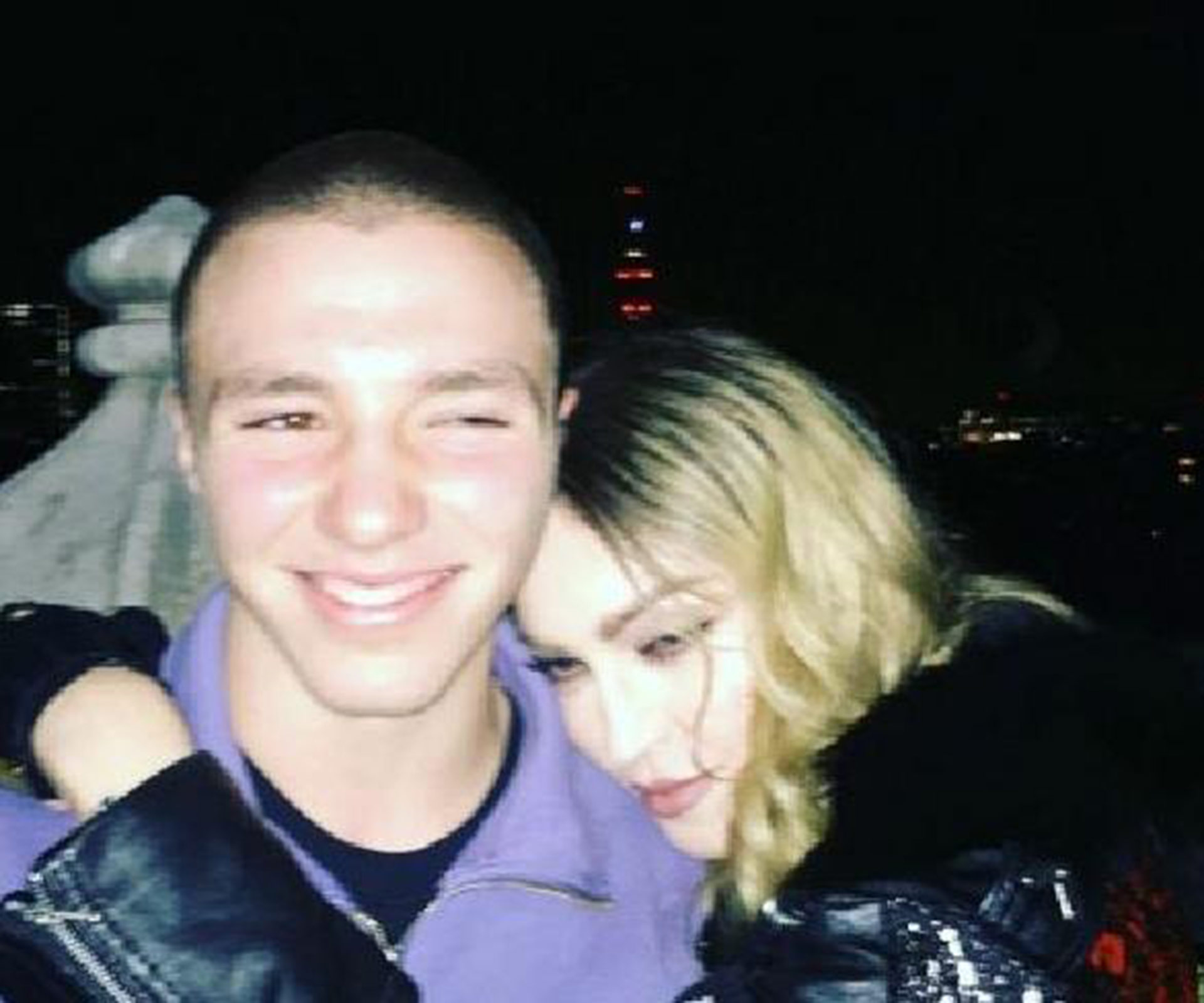Madonna stands by 16-year-old son Rocco following his arrest