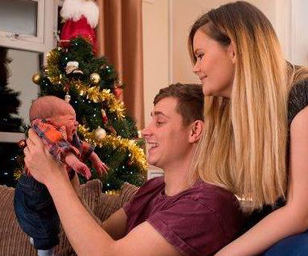 Jessica Jenkins and her husband Rhys with their newborn son, Jack.