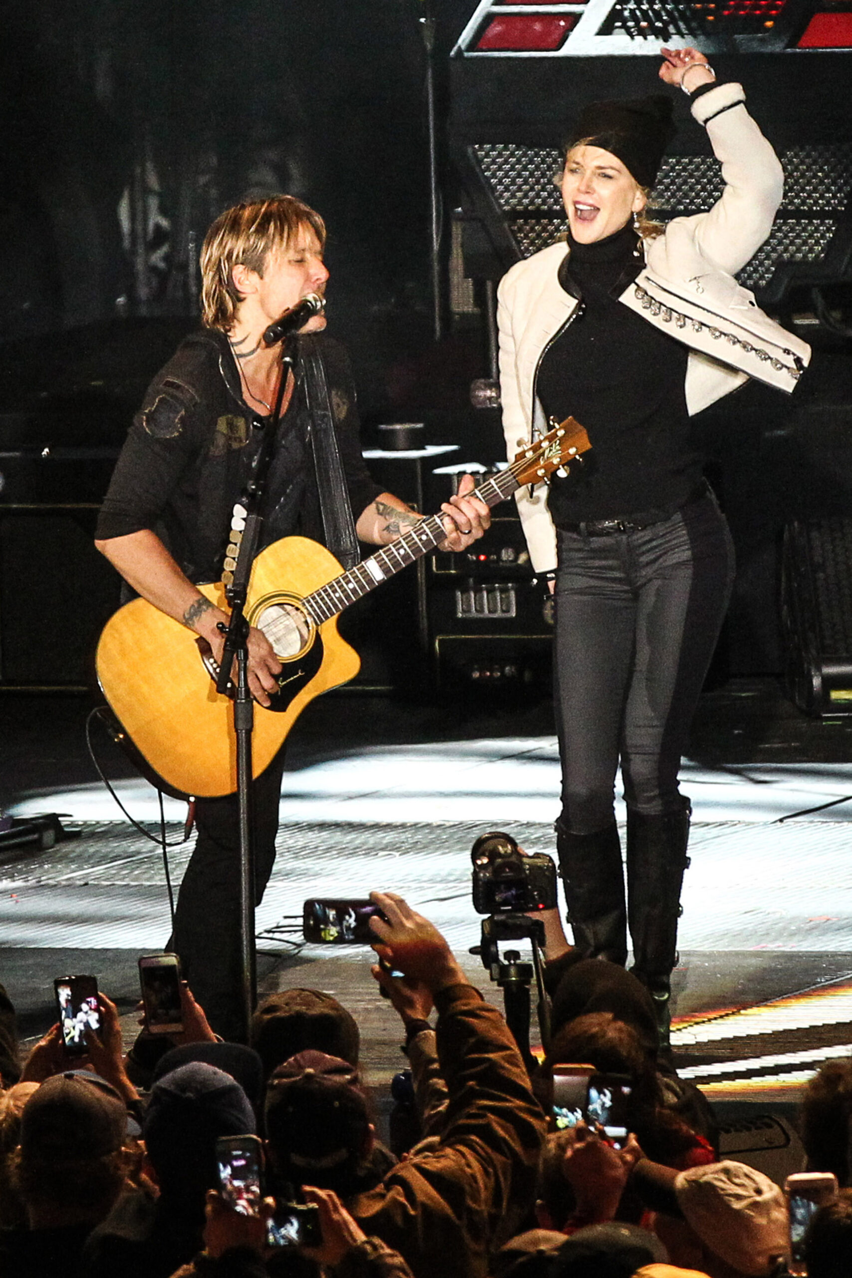 Nicole Kidman dancing along to Keith Urban at a CNN gig