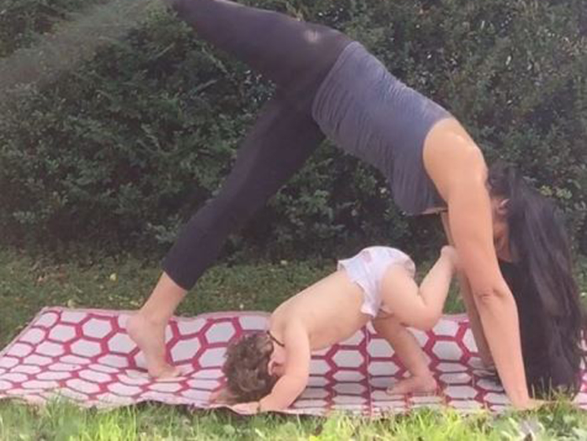 Yogi slammed for breastfeeding upside down