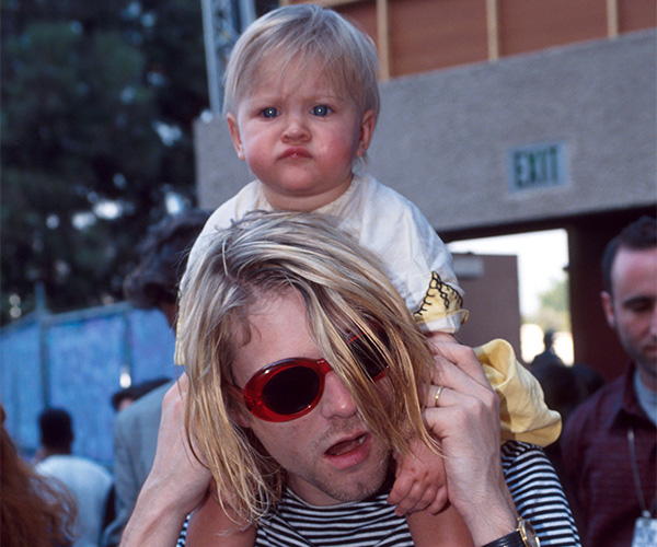 Frances Bean Cobain with her dad Kurt Cobain.