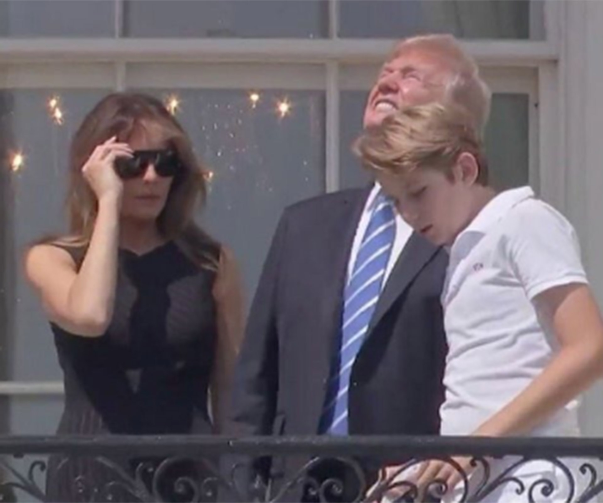 Donald Trump looks directly at the sun during the eclipse and we're just like WTF?