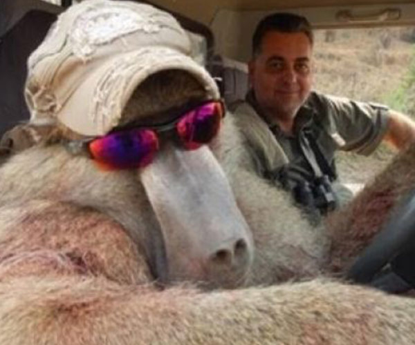 This is SICKENING! Photos emerge of Australian business man posing trophy kills