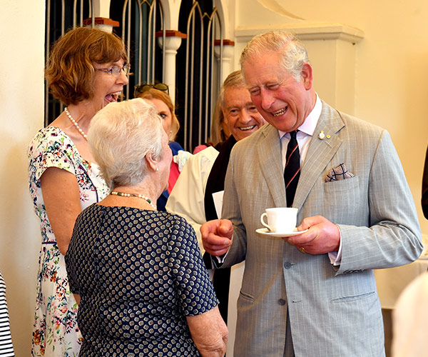 Prince Charles heads to Cairns for a packed day with tears, tea and bugles