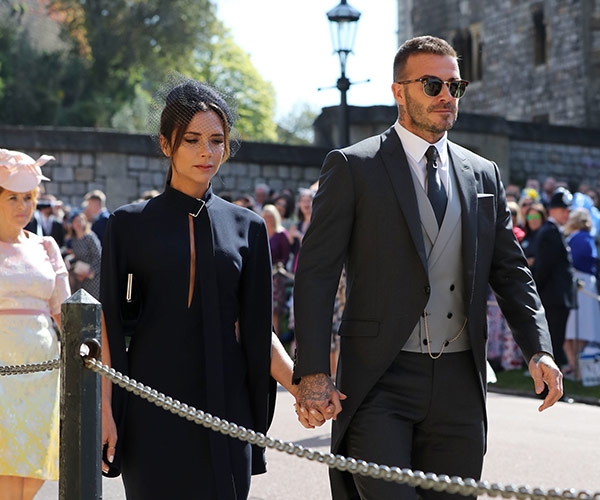 Victoria and David Beckham arrive at the Royal Wedding