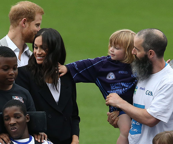 Cheeky toddler pulls Meghan Markle’s hair and Prince Harry can’t stop laughing