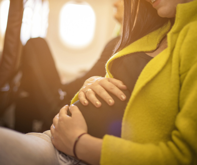 Everything you need to know about flying while pregnant and what to do once you get to your destination