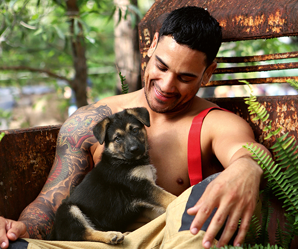 14 very visual reasons why you need a shirtless firefighter holding a puppy in your life